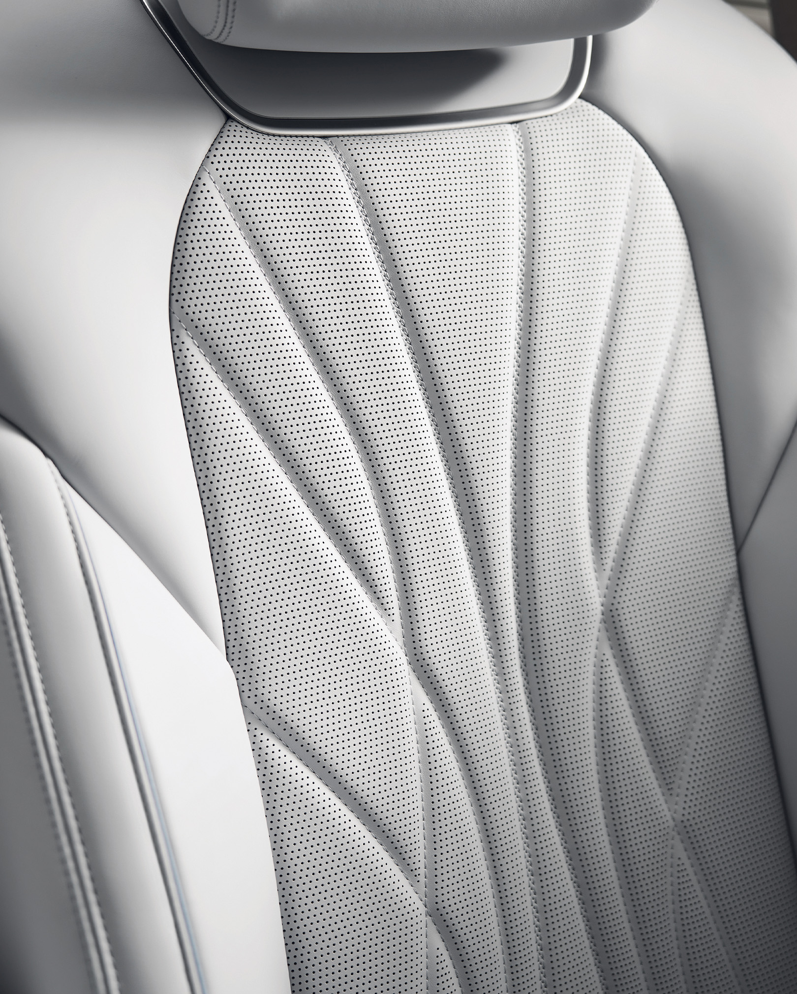 The light gray GV70 leather seats are magnified.